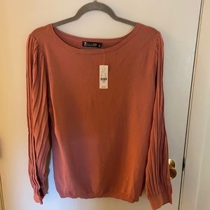 Pleated long sleeve top, great for work or fun!